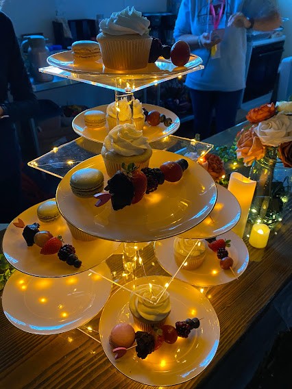 This is a candlelit tier of desserts that were served to birth moms who were attending the 3rd Annual Fireweed Retreat for Birth Moms